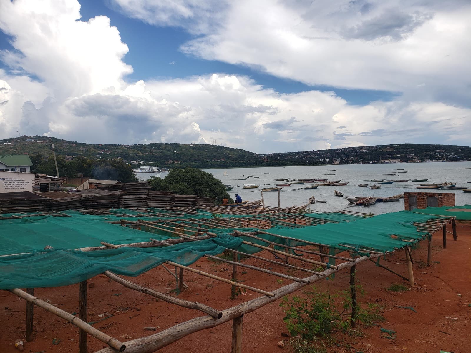 Lake Tanganyika harbour — fishing boats and drying racks